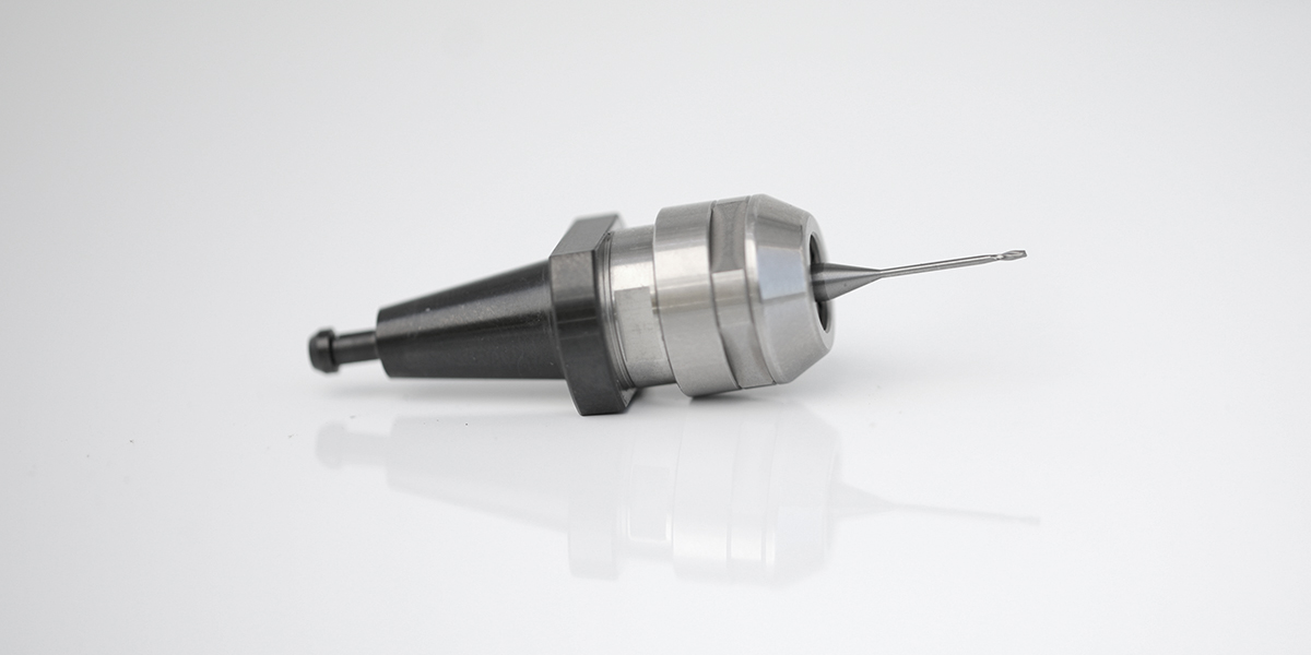 A conical taper tool holder with a fine end mill in the collet