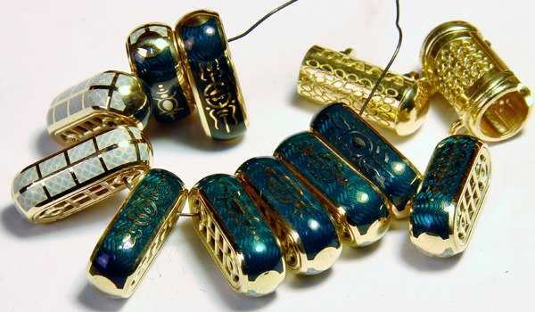 Flask → cast gold parts → enamel application